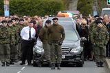 thumbnail: A guard of honour flanks the coffin of Michael Barr at his funeral in Strabane Co Tyrone this morning. Barr was shot dead at the end of April in a pub in Dublin.
PACEMAKER BELFAST   05/05/2016