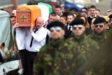 thumbnail: A guard of honour flanks the coffin of Michael Barr at his funeral in Strabane Co Tyrone this morning. Barr was shot dead at the end of April in a pub in Dublin. It is thought his murder is part of a bitter feud between rival gangs in the city.
PACEMAKER BELFAST   05/05/2016