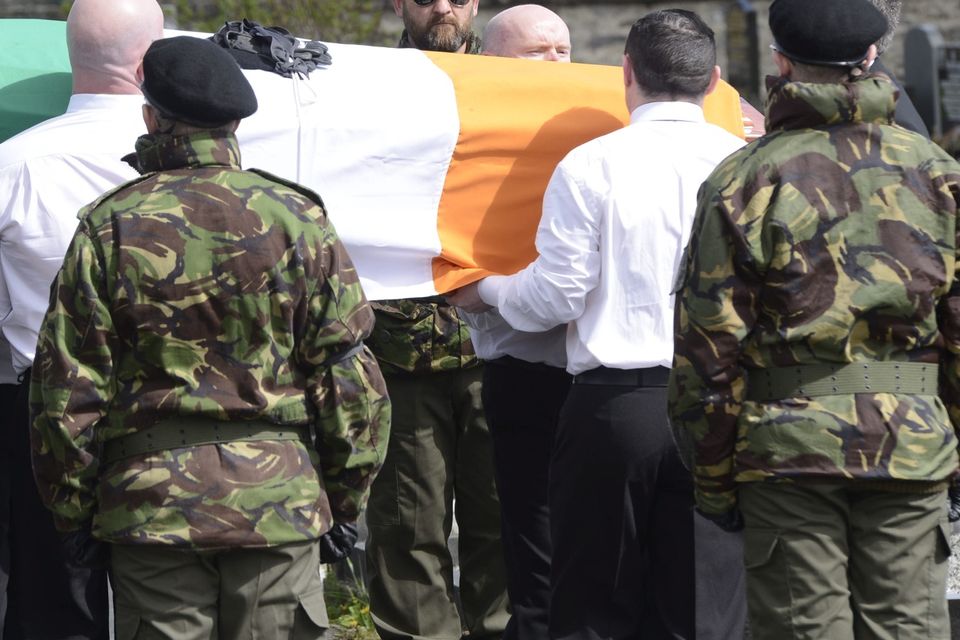 A guard of honour flanks the coffin of Michael Barr at his funeral in Strabane Co Tyrone this morning. Barr was shot dead at the end of April in a pub in Dublin. It is thought his murder is part of a bitter feud between rival gangs in the city.
PACEMAKER BELFAST   05/05/2016