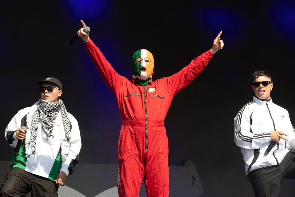 Mo Chara, DJ Provaí and Móglaí Bap of Kneecap performs on the West Holts Stage during during day four of Glastonbury Festival.