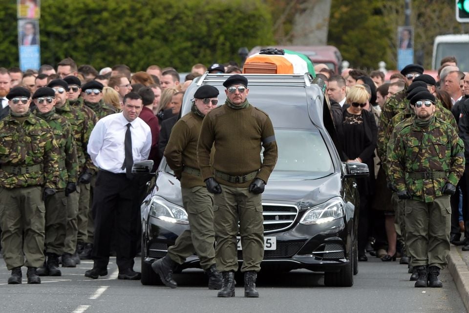 A guard of honour flanks the coffin of Michael Barr at his funeral in Strabane Co Tyrone this morning. Barr was shot dead at the end of April in a pub in Dublin.
PACEMAKER BELFAST   05/05/2016