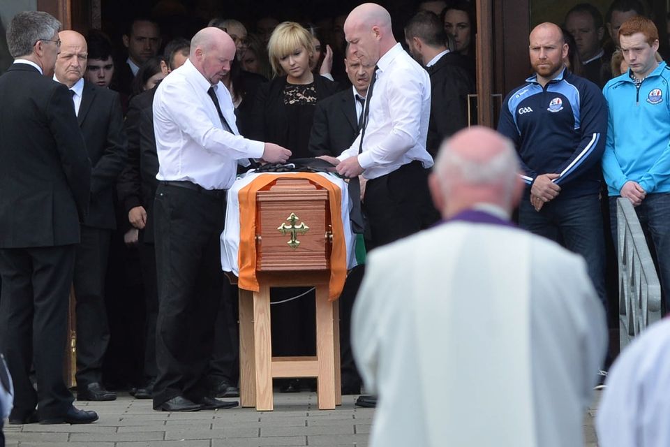 A guard of honour flanks the coffin of Michael Barr at his funeral in Strabane Co Tyrone this morning. Barr was shot dead at the end of April in a pub in Dublin. It is thought his murder is part of a bitter feud between rival gangs in the city.
PACEMAKER BELFAST   05/05/2016