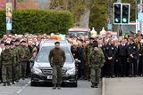 thumbnail: A guard of honour flanks the coffin of Michael Barr at his funeral in Strabane Co Tyrone this morning. Barr was shot dead at the end of April in a pub in Dublin. It is thought his murder is part of a bitter feud between rival gangs in the city.
PACEMAKER BELFAST   05/05/2016