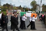 thumbnail: A guard of honour flanks the coffin of Michael Barr at his funeral in Strabane Co Tyrone this morning. Barr was shot dead at the end of April in a pub in Dublin. It is thought his murder is part of a bitter feud between rival gangs in the city.
PACEMAKER BELFAST   05/05/2016