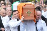 thumbnail: A guard of honour flanks the coffin of Michael Barr at his funeral in Strabane Co Tyrone this morning. Barr was shot dead at the end of April in a pub in Dublin. It is thought his murder is part of a bitter feud between rival gangs in the city.
PACEMAKER BELFAST   05/05/2016